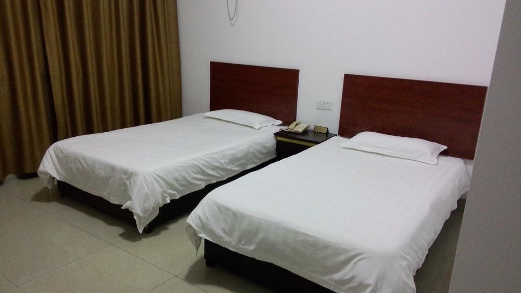 Weihai Times Business Hotel Rum bild